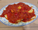 Foto del paso 7 de la receta: Bacalao rebozado con tomate y pimientos asados