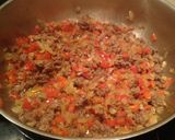 A picture of step 2 of Baked rice with minced meat .