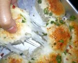 A picture of step 6 of Pull apart cheesy pav.