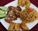 A picture of step 14 of Cheesy Chicken with spaghetti & potato wedges.