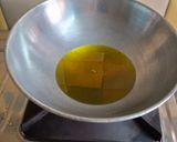A picture of step 5 of Amla pickle in mustard oil.