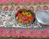 A picture of step 14 of Kaju ki burfi (cherries 🍒 and rose flavour) and laddoo (pan flavour).