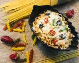 A picture of step 9 of Spaghetti with cheese and pepper.