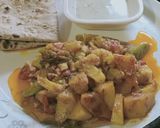 A picture of step 7 of Achari aloo gobhi.
