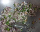 A picture of step 1 of Left Over Masala Rice.