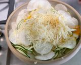Une image de l'étape 12 de Gratin de navet blanc et courgette au jambon cru et emmental.