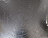 A picture of step 5 of Coconut Khoya Dry Fruit Fudge.