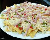 A picture of step 4 of Mexican Nachos with Peppers, Onion, and Bacon.