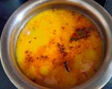 A picture of step 3 of Moong dal- Moong dal with clove and green chilli.