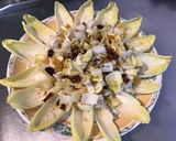 Une image de l'étape 8 de Salade d'endives aux pistaches, abricots secs et tomates séchées.