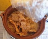 A picture of step 3 of Chicharrón in Red Sauce.