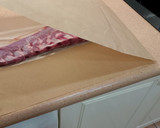 Foto del paso 3 de la receta: Costillar cerdo con salsa barbacoa en papillote