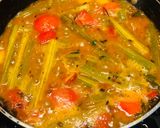 A picture of step 4 of Drumsticks pumpkin sweet sour curry.