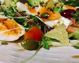 A picture of step 3 of Boiled Egg Baby Greens and Fruit Salad.