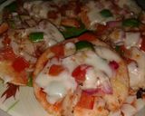 A picture of step 4 of Bread pizza(without oven).