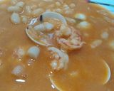 Foto del paso 6 de la receta: Judías con almejas y langostinos