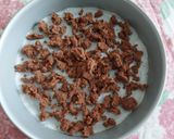 Foto del passaggio 10 della ricetta Sbriciolata al cioccolato e pere con confettura di pere e cacao