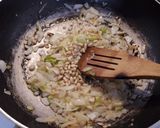 Foto del paso 2 de la receta Bacalao a la baezana (con tomate y guisantes)