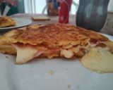 Foto del paso 6 de la receta: Tortilla de papas rellena de jamón y queso