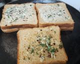 A picture of step 4 of Garlic Brown Bread with peri peri masala Dominos style sticks.