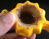 A picture of step 7 of Nolen Gur er jolbhara sandesh (date palm jaggery sandesh).