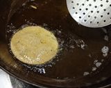 A picture of step 7 of Aloo puri.