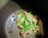 A picture of step 1 of Aalu soyabean pulav.