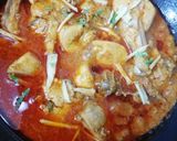 A picture of step 16 of Chicken makhni karahi.