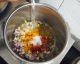 A picture of step 3 of Kathiyawadi Masala Khichdi.