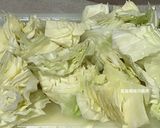 A picture of step 2 of Curry Chicken with Cabbage.