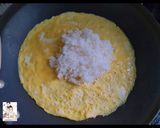 A picture of step 4 of Thai Basil Pork Fried Rice Wrapped in Omelet (Kid-Friendly).