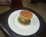 A picture of step 9 of Caramelized onions chicken burger.
