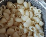 A picture of step 2 of CHEESY GARLIC PASTA in WHITE SAUCE.