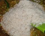 A picture of step 8 of Matar Pulao.