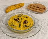 A picture of step 11 of Pazham Kalan-Kerala Ripe Banana Curry (with Phulka) -Sadya Special.