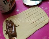 A picture of step 7 of Nutella stuffed caterpillar buns.