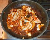 A picture of step 5 of Mike's 10 Minute Smothered Pork Loin Chop Complete Meal.