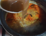 A picture of step 4 of Colourful Stringhoppers with Crab stew.