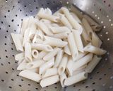 A picture of step 1 of Orange Penne Pasta with Crispy Herb Bread.