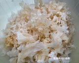 A picture of step 2 of Black Date, Snow Fungus, and Lotus Seed Sweet Soup.