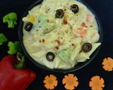 A picture of step 8 of Cheesy and Creamy veggie white sauce penne pasta (with fresh cream, cheese and seasonings).
