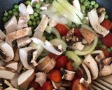 A picture of step 2 of Chicken and Bean Shoot stir-fry.