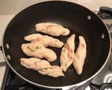 A picture of step 5 of Pan-fried hotdog & spring onion rolls.