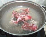 A picture of step 1 of Salted Mustard Green And Tofu Pork Soup.