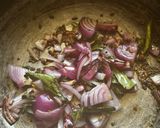 A picture of step 1 of Drumsticks Curry.