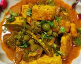 A picture of step 10 of Green Peas and Paneer Curry.