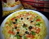 A picture of step 5 of Shell Pasta Pizza.