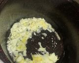 A picture of step 2 of Egg rice.
