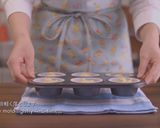 A picture of step 8 of Chocolate ChunkPistachio Muffins.