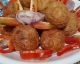 A picture of step 5 of Yam Balls in breadcrumbs.